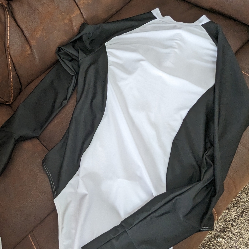 Black and white zippered long sleeved swimsuit